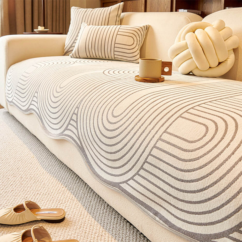 Textured chenille couch cover with a unique abstract pattern, perfect for modern home decor.