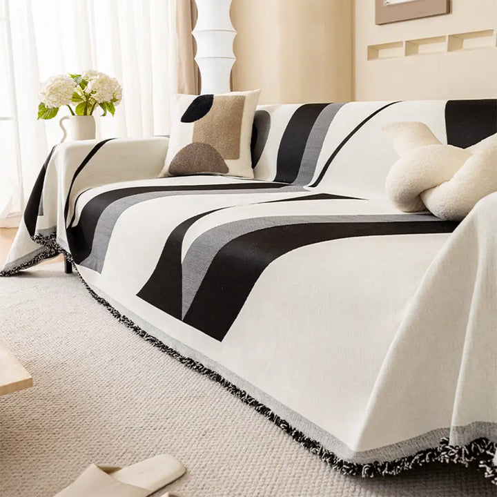 Close-up of chenille sofa cover fabric, soft, textured, universal fit, ideal for home decor