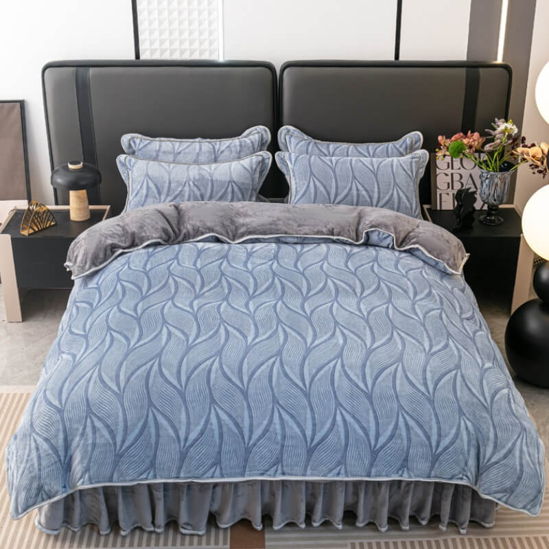 Full view of luxurious velvet bedding set with elegant leaf pattern and matching bed skirt.