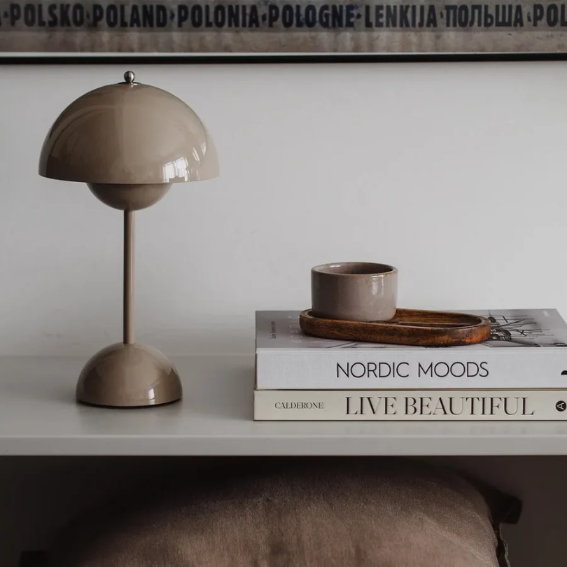 Versatile touch sensitive table lamp, providing colorful ambient lighting for any room.