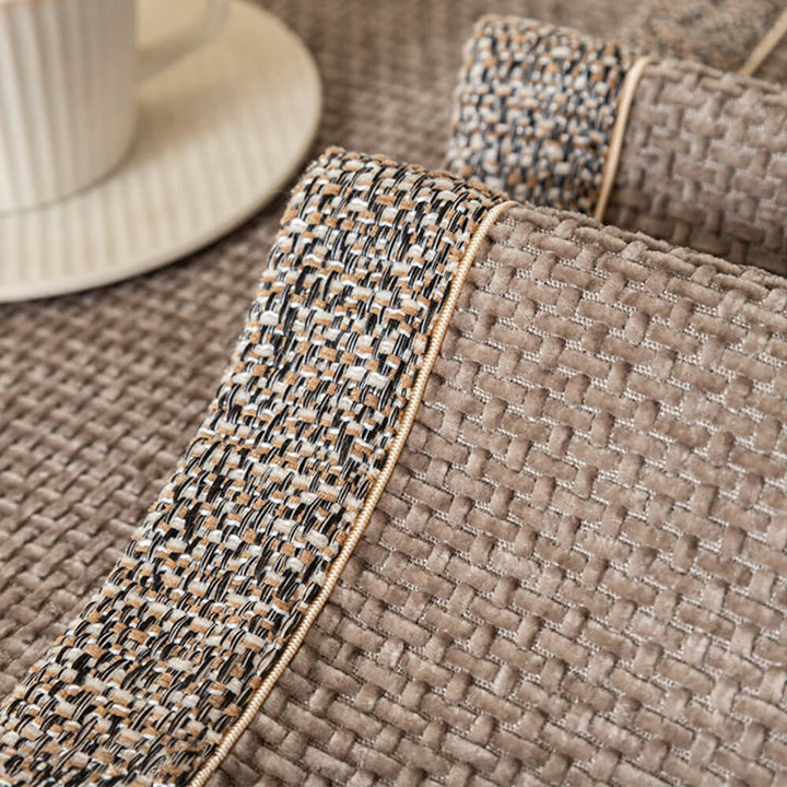 Anti-slip backing detail of a modern chenille tweed couch cover, ensuring stability