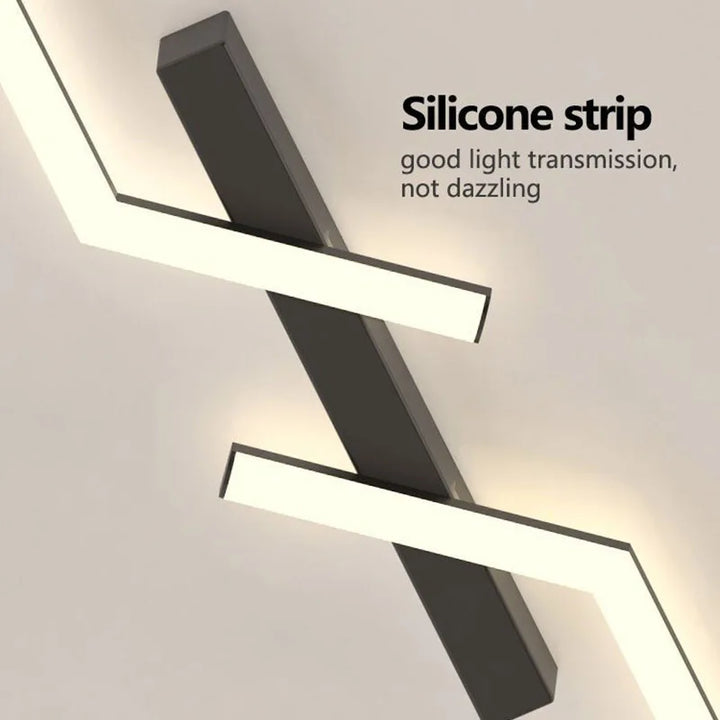 "Moderne LED-Deckenleuchte, minimalistisch, schwarze & goldene Linien, energieeffizient, ideal für Wohn- & Esszimmer."