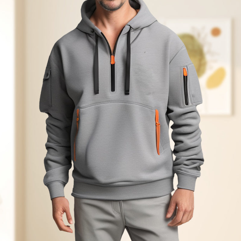 "Moderner Adriano Hoodie mit halbem Reißverschluss, minimalistisch, grau, weich, atmungsaktiv, stilvoll und flexibel."