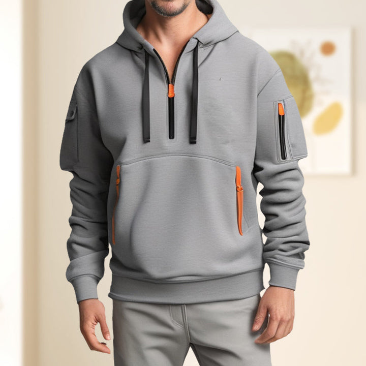 "Moderner Adriano Hoodie mit halbem Reißverschluss, minimalistisch, grau, weich, atmungsaktiv, stilvoll und flexibel."
