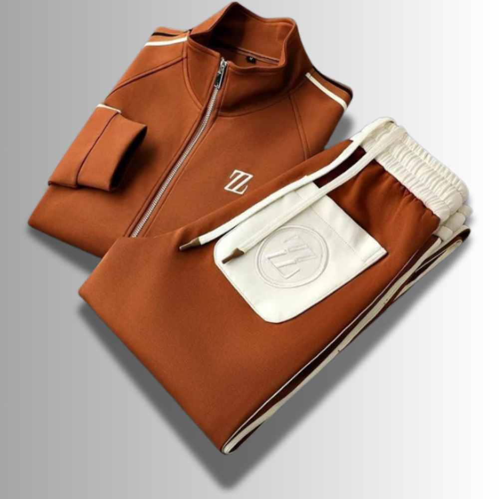 Moderner Herren Jogginganzug, atmungsaktiv, in Grau mit Kapuze und Taschen, ideal für Sport und Freizeit.