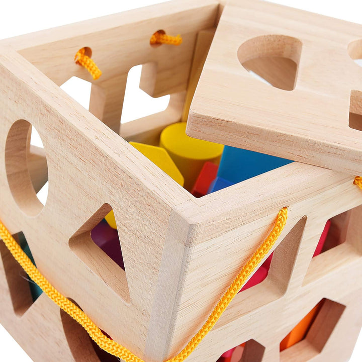 Montessori Holz-Lernwürfel in bunten Farben, Formen wie Dreiecke und Kreise, ideal für frühkindliche Entwicklung.