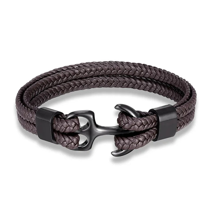 Men's leather anchor bracelet worn on wrist, showcasing rugged nautical style.