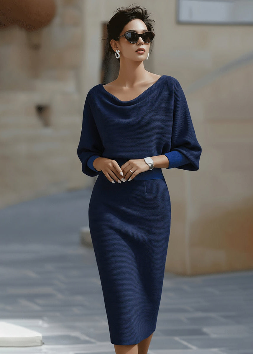 Modest yet chic long sleeve midi dress featuring a relaxed batwing fit and elegant cowl neck detail.