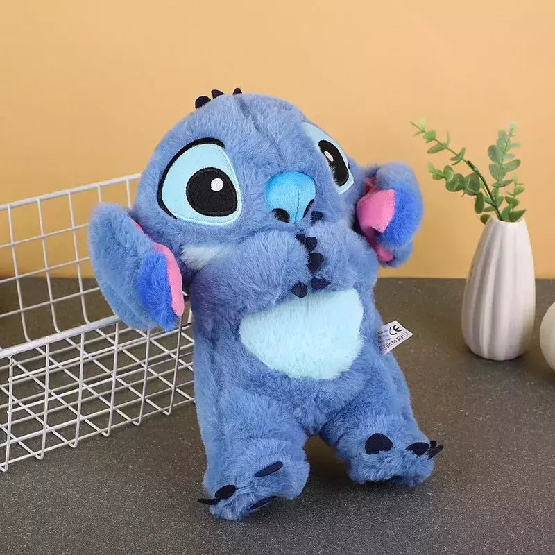 "Niedliches Stofftier Stitch mit integrierten Lichtern und Musik, ideal für beruhigenden Schlaf und Disney-Fans."