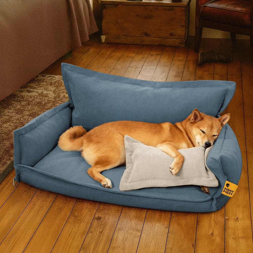 Dog furniture: a plush orthopedic dog bed with a removable pillow, enhancing pet comfort.
