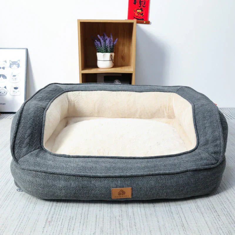 Stylish dog furniture: an orthopedic dog bed with a washable cover, blending into home decor.