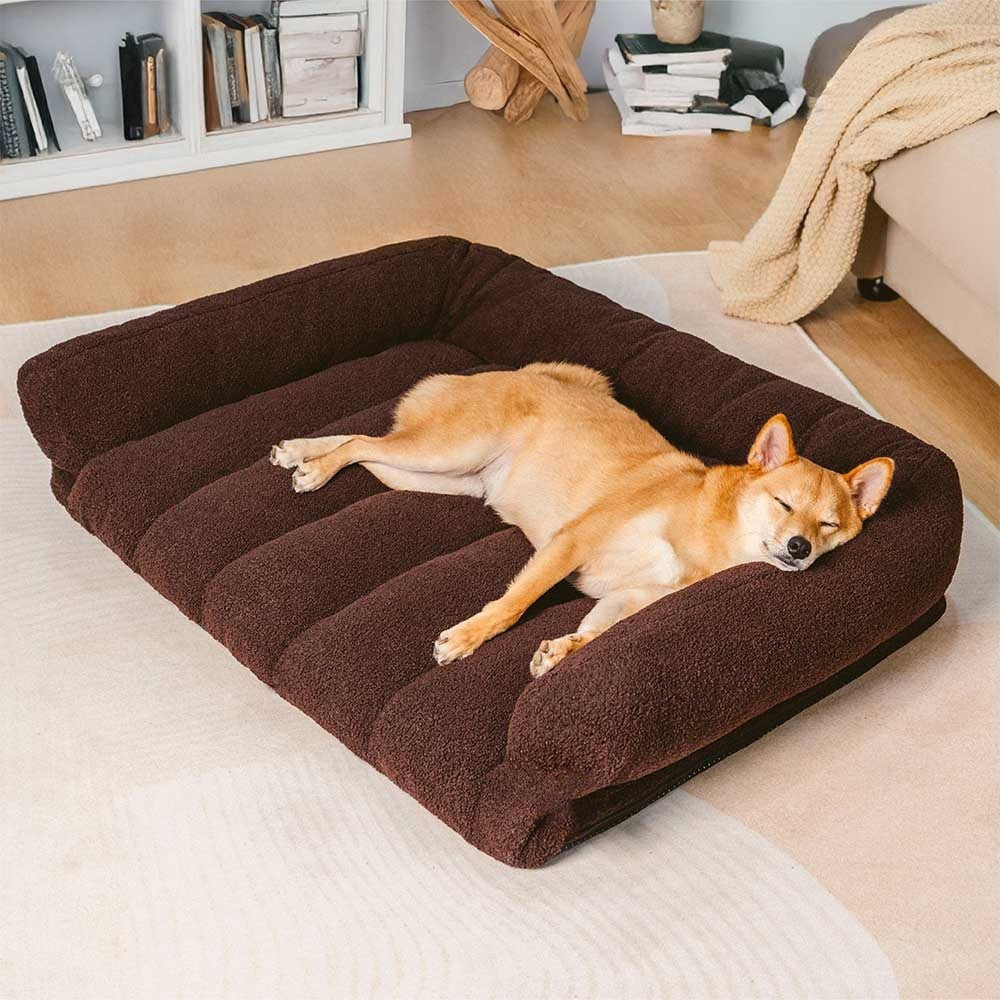 Khaki orthopedic dog bed, featuring a bolstered headrest for joint support & comfort.