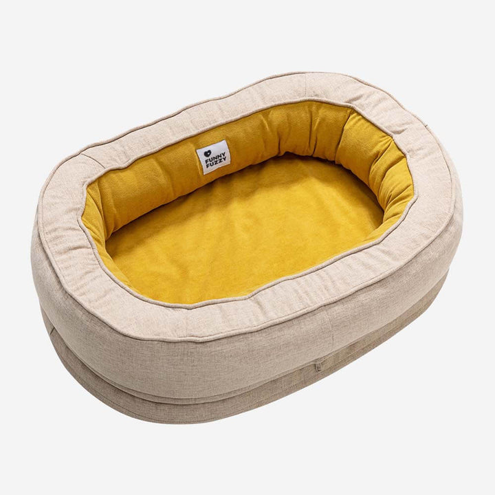 Grey orthopedic donut dog bed, a washable and supportive pet bed for deep sleep.