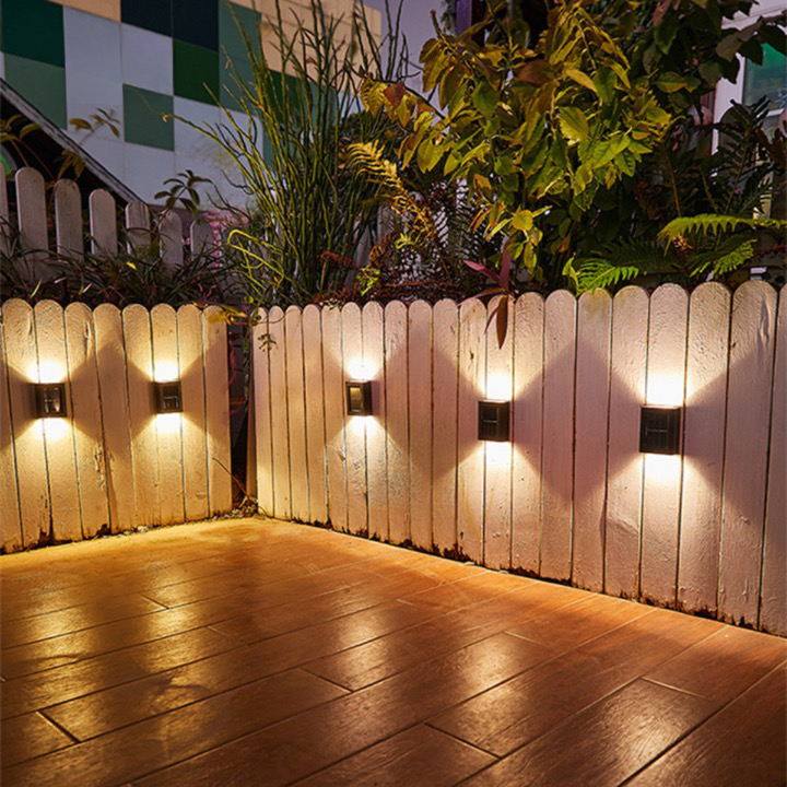 Energy-efficient wireless solar LED wall light for outdoor garden, patio, & pathway illumination.