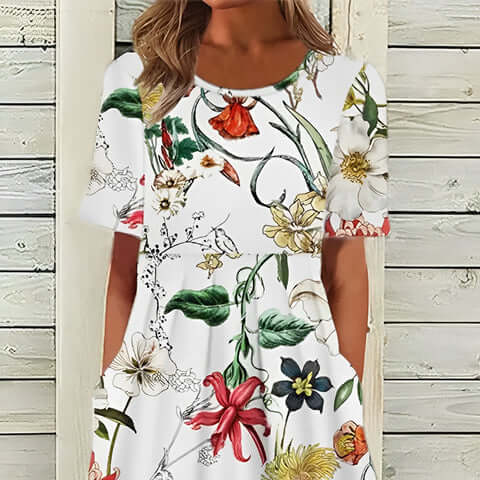 Elegantes weißes Kleid mit floralen Mustern für Damen