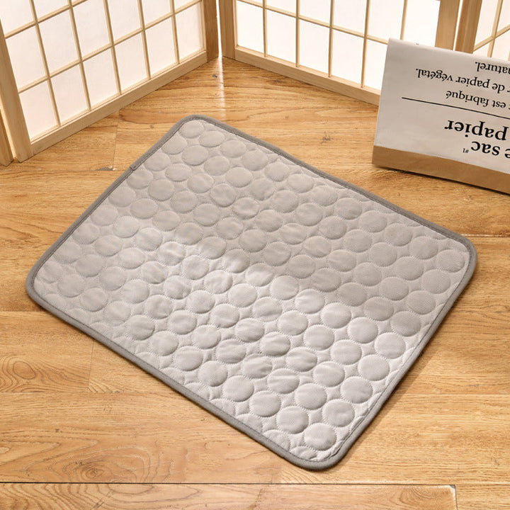 Refreshing pet cooling mat, blue design, provides instant relief for dogs & cats in summer.