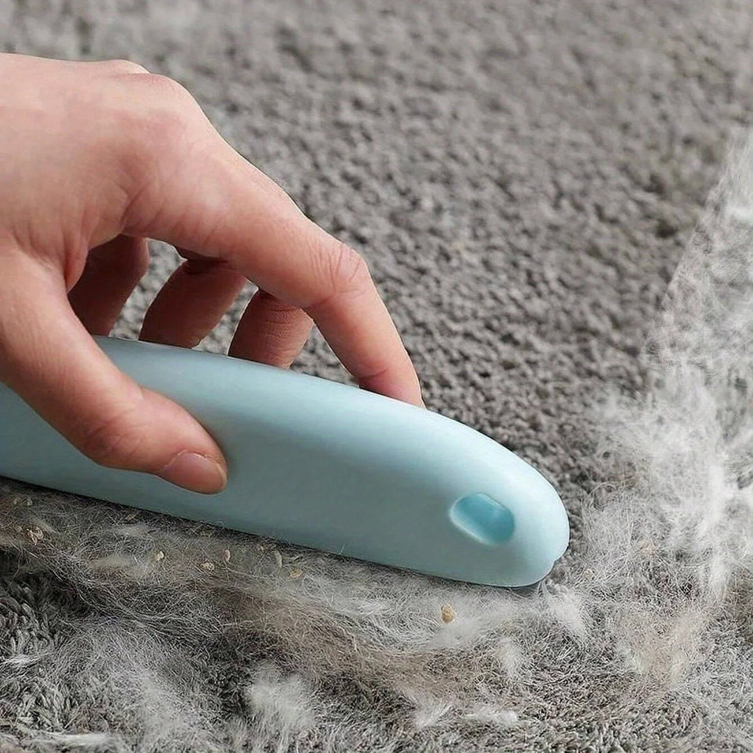 Close-up of pet grooming brush bristles, designed for comfortable deshedding of dog & cat fur
