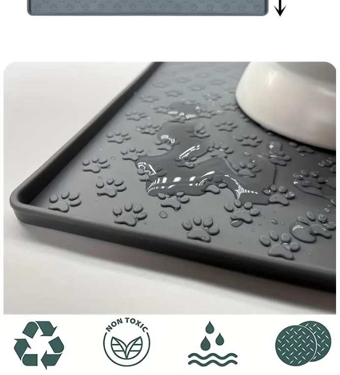 Non-slip gray silicone mat with two stainless steel pet bowls, ideal for dog or cat feeding