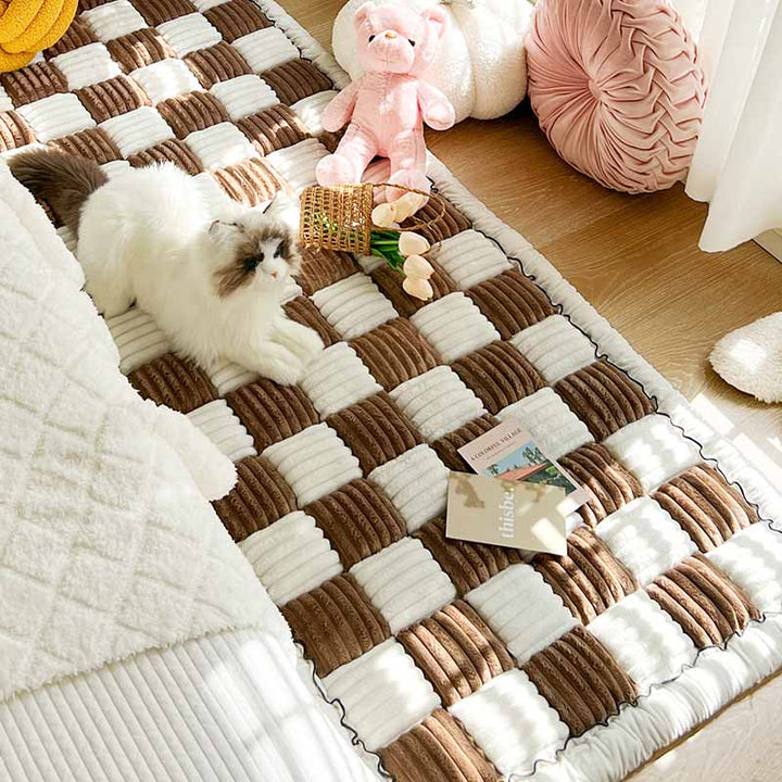 Quilted cotton pet sofa protector, dark gray, designed for active pets, non-slip feature shown