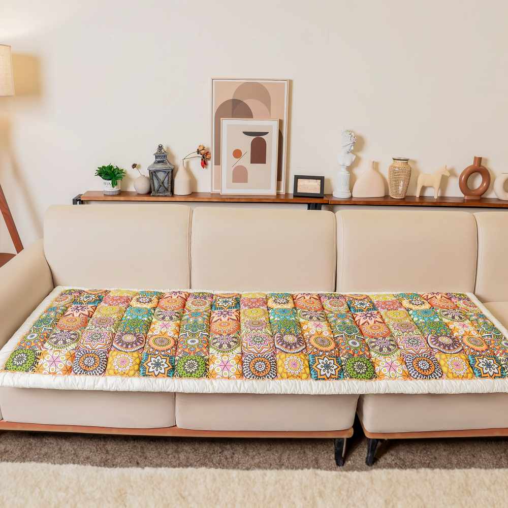 Non-slip scratch resistant cotton couch cover for pets, shown on a dark brown leather sofa