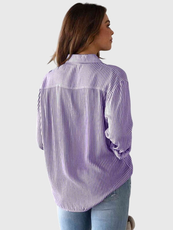Casual blue striped button-down shirt for women, comfortable long sleeve top.