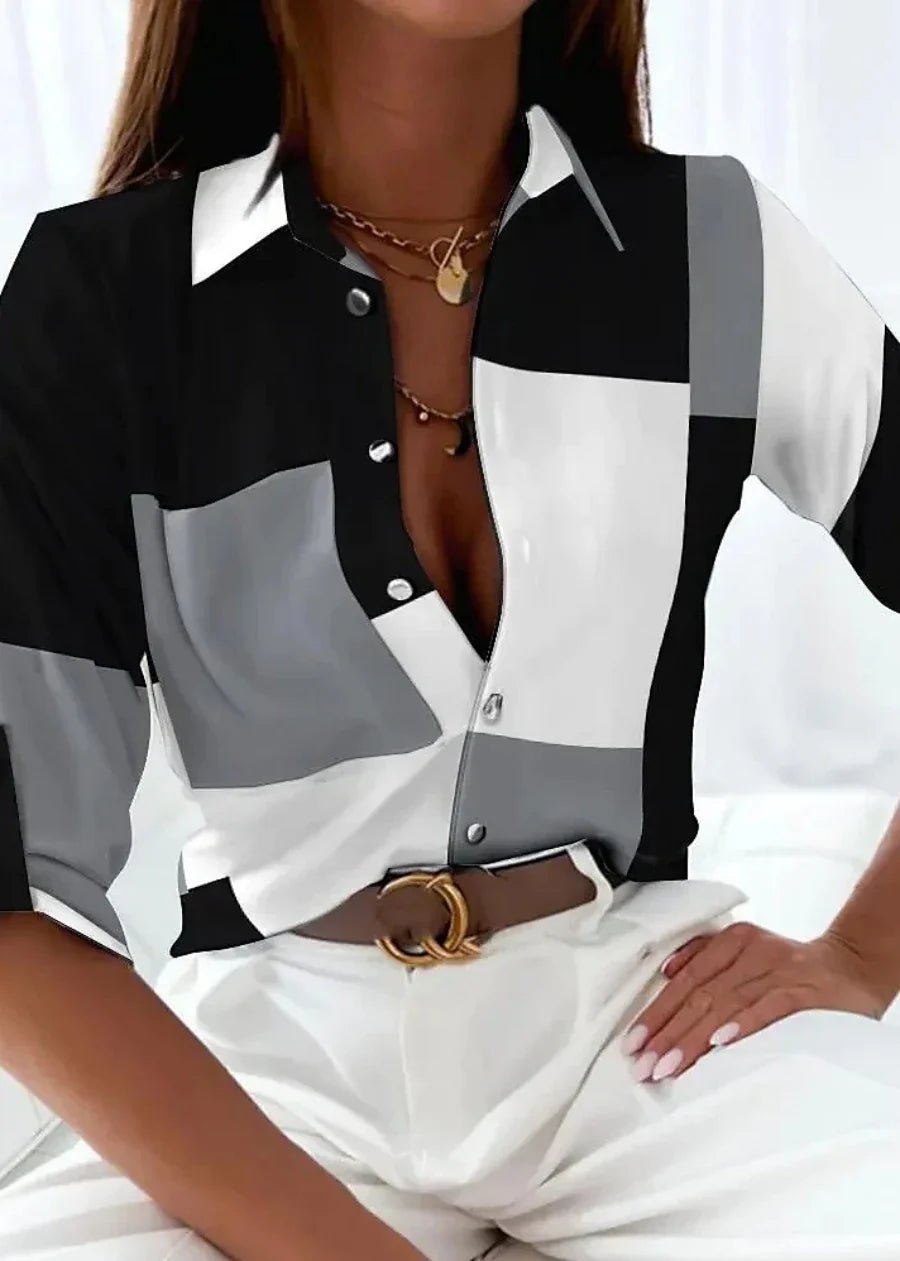 Trendy plus size women's collared blouse, featuring a vibrant abstract geometric print. Versatile for modern fashion.