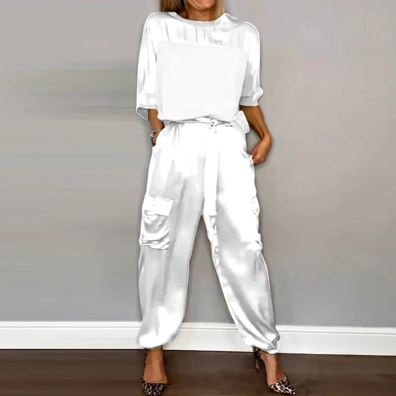 Chic plus size women's cargo two-piece set, offering a comfortable & stylish utility look with drawstring pants.
