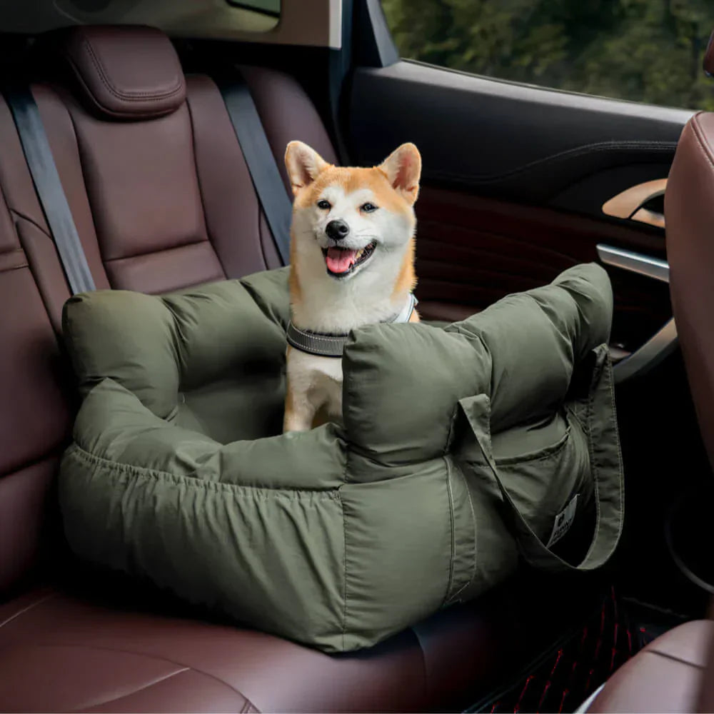 Pet car seat accessory, designed for small dogs, featuring safety harness clip.