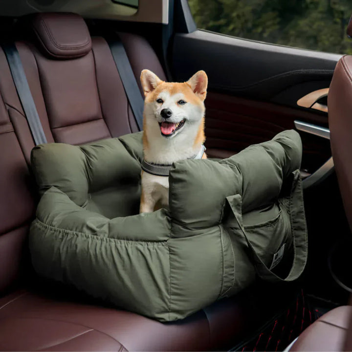 Pet car seat accessory, designed for small dogs, featuring safety harness clip.