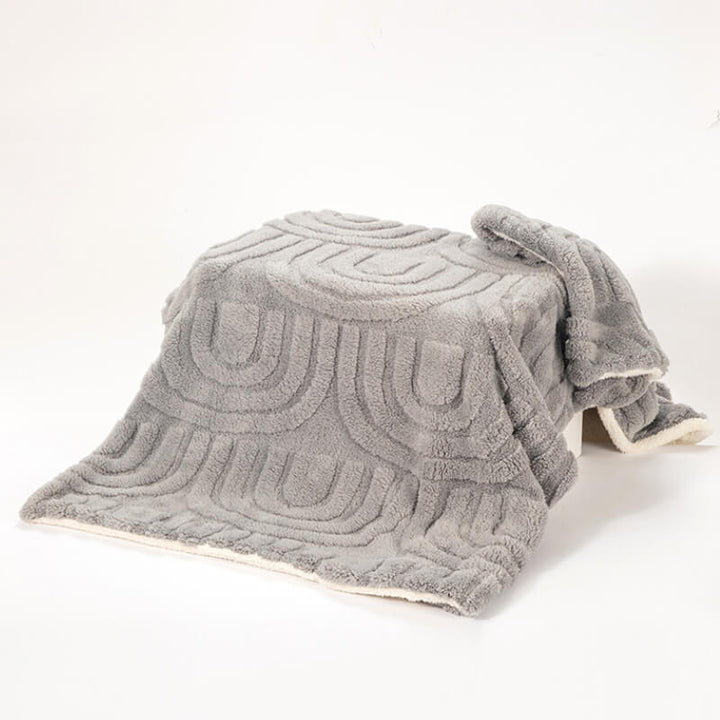 Unisex pet blanket, warm and plush, featuring a reversible double-sided design for comfort.