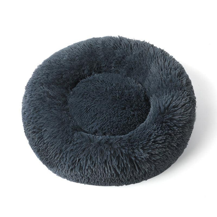 Medium sized calming dog bed, faux fur, offering deep sleep & anti-anxiety relief.