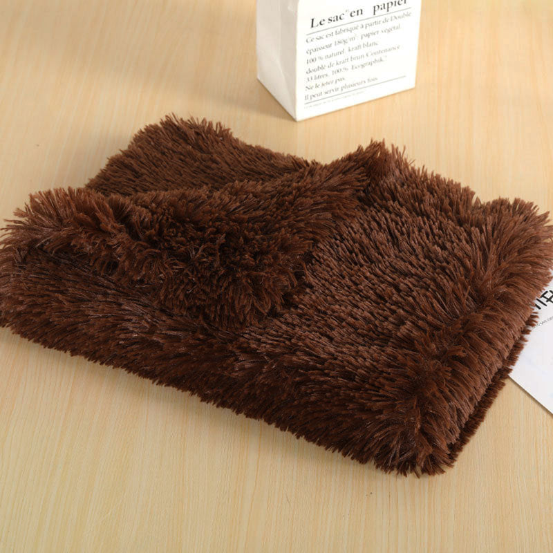 Overhead view of a rectangular plush pet blanket, cozy and washable bed mat for pets