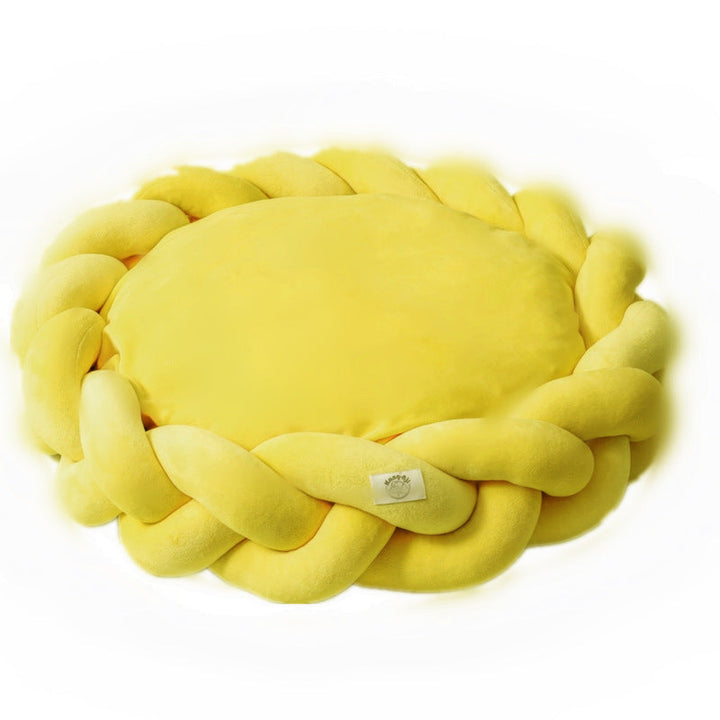 Plush luxury dog bed with braided edges, perfect for ultimate pet comfort and support.