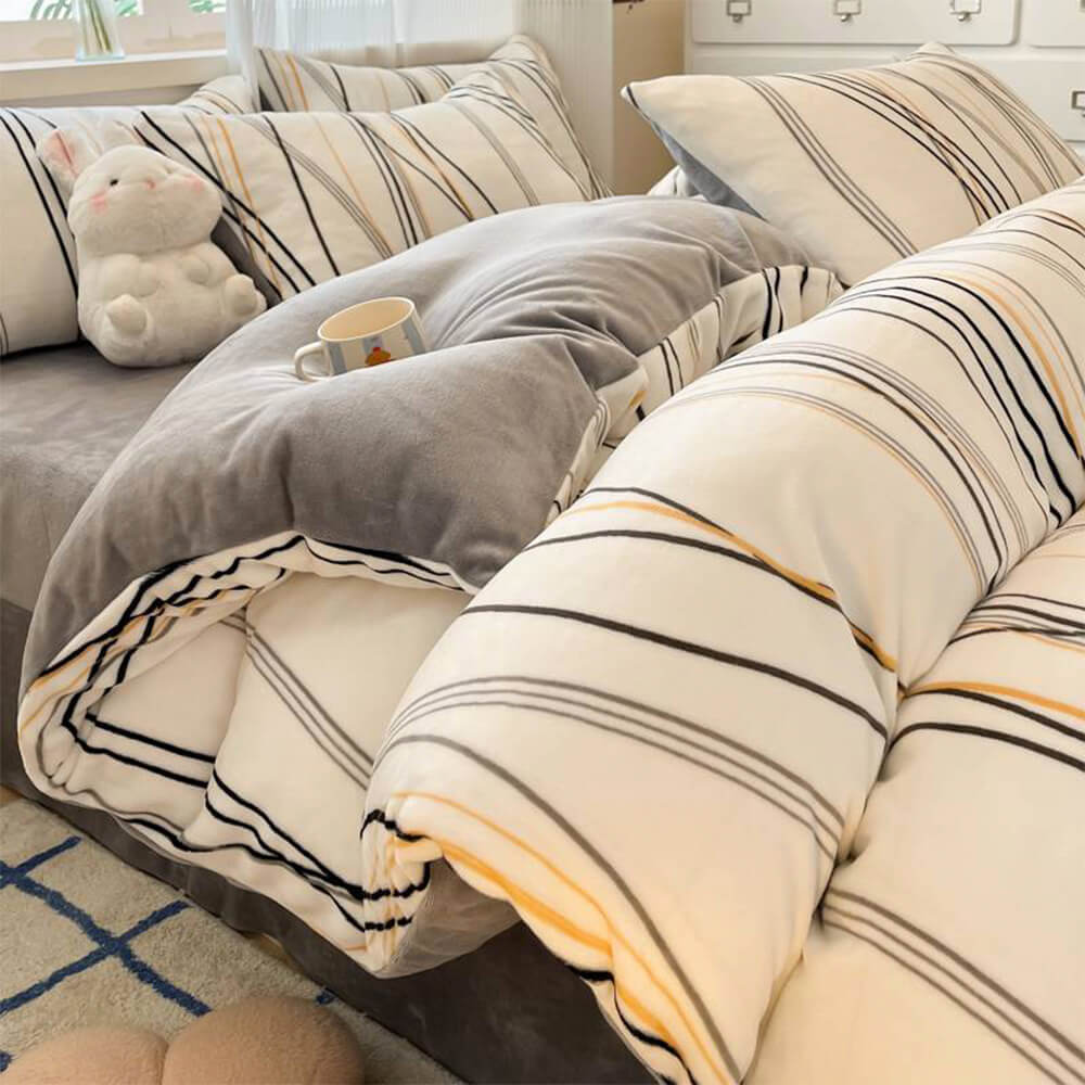 Bedroom featuring a complete milk velvet warm bedding set; quilt cover, sheet, and pillowcases
