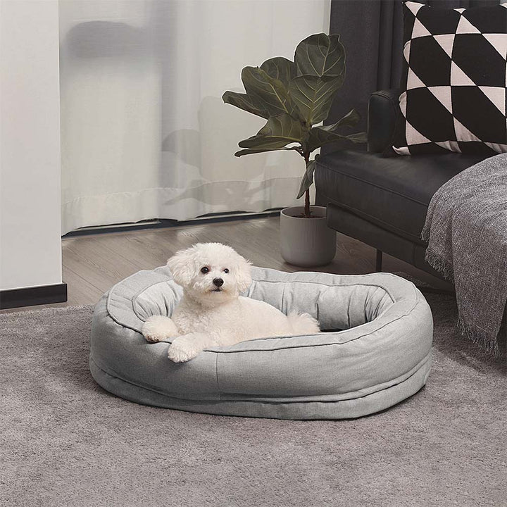 Cozy fluffy orthopedic dog bed, washable and warm, for all-around pet comfort.