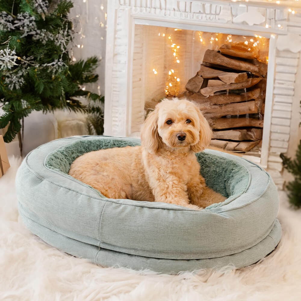 Enveloping fluffy orthopedic pet bed, round shape, offering full body joint support.