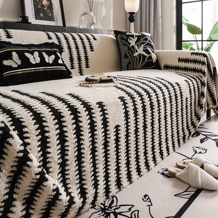 Soft, pet-friendly plush couch cover draped over a sofa, showing wrinkle-resistant, full coverage design