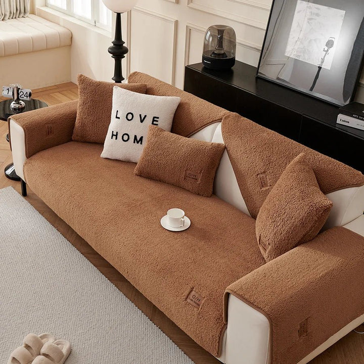 Pet-friendly plush couch protector, machine washable for easy maintenance in busy homes.