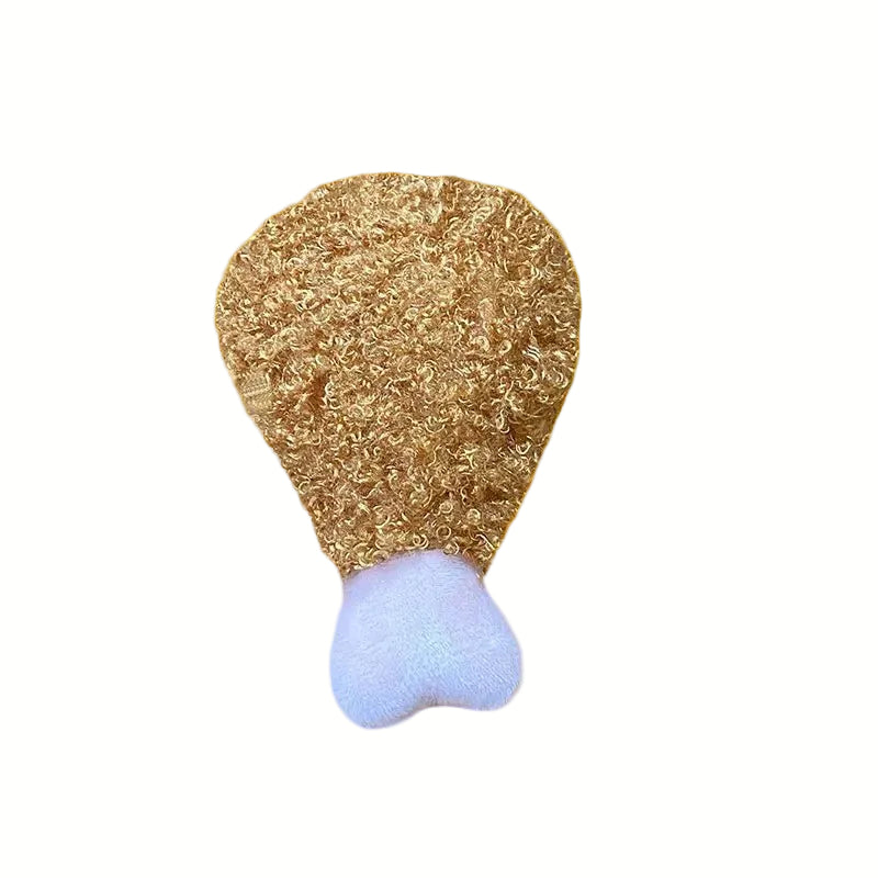 Brown donut plush squeaky dog toy with pink frosting, engaging interactive toy for pets.