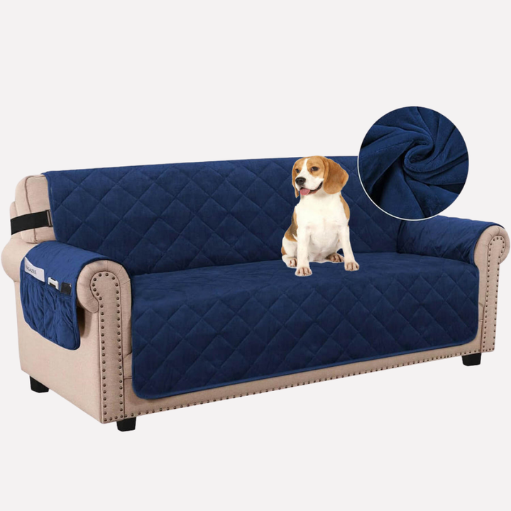 Beige velvet sofa cover with elastic straps and non-slip backing, a durable furniture protector.