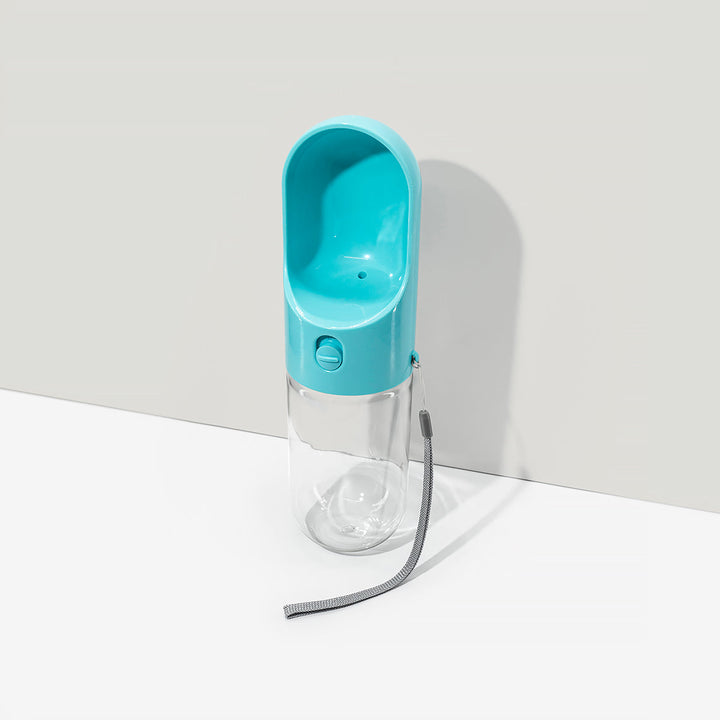 Dog water bottle, portable & lightweight, ideal for active dogs & outdoor hydration.