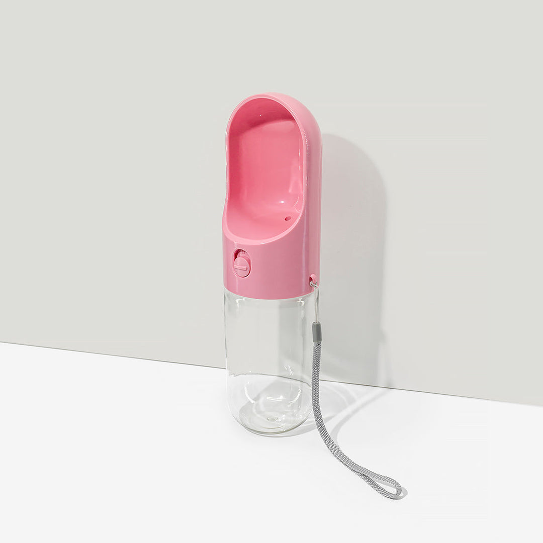 Portable dogbottle for hydration, featuring an easy-to-use water dispenser