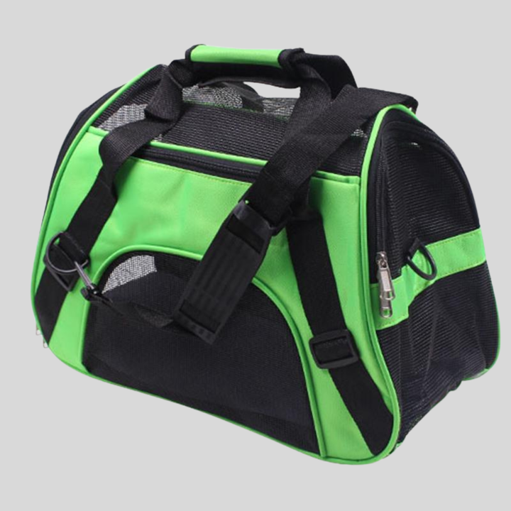 Small pet travel bag, carrier for puppy or kitten, includes shoulder strap and soft interior.