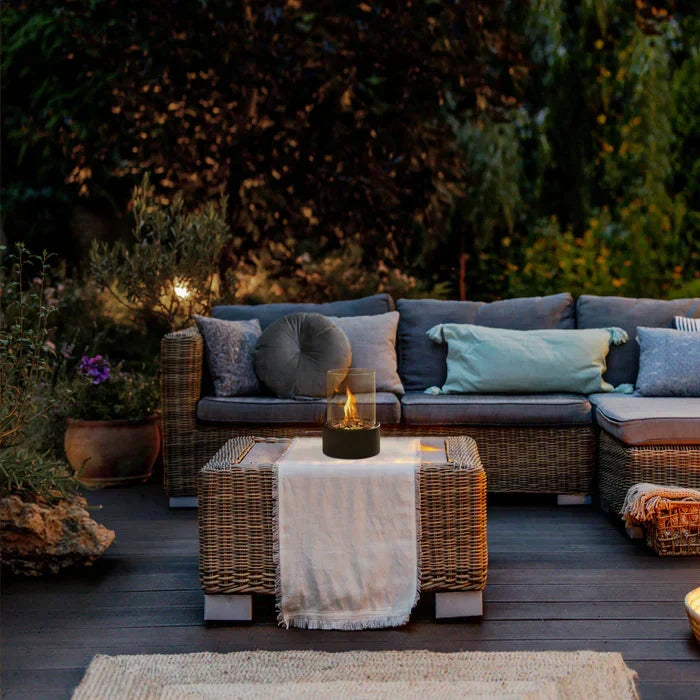 Stylish portable fire lantern, steel and glass, perfect for patio or living room ambiance.
