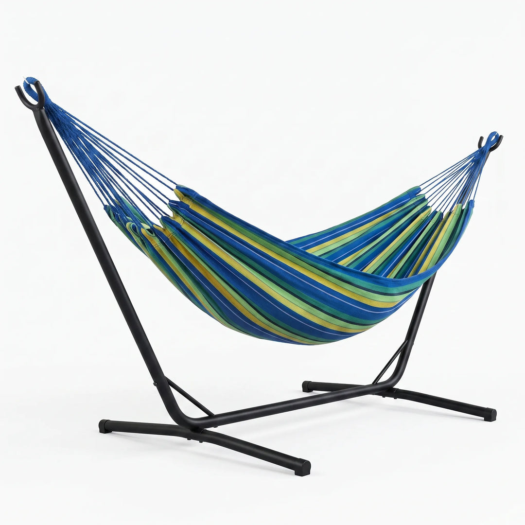 Versatile striped canvas portable hammock for outdoor relaxation, camping gear, and garden leisure. Easy to carry.