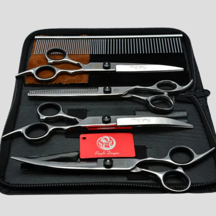 Professional pet grooming scissors kit with thinning shears, curved, and straight scissors for dogs and cats