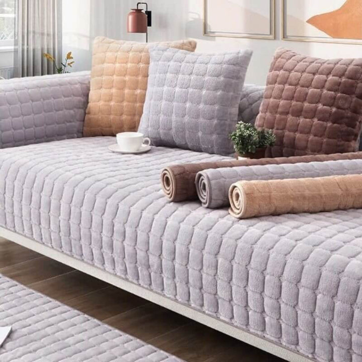 Scratch-resistant flannel throw for sofa, anti-slip, quilted for pet-friendly home decor.