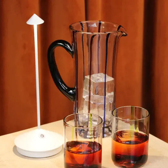 Portable ambient LED light, rechargeable & cordless, ideal for any room or outdoor setting.