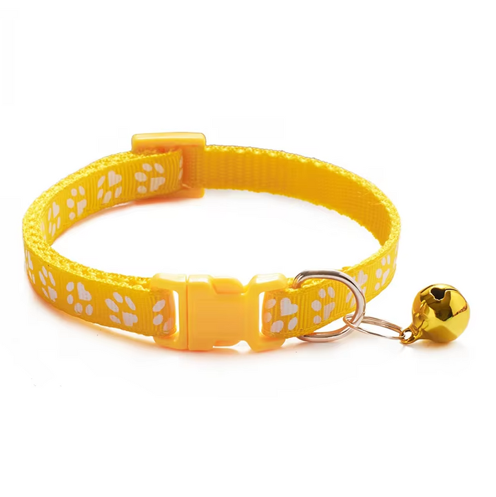 Quick release cat collar in a vibrant blue, featuring a playful paw print