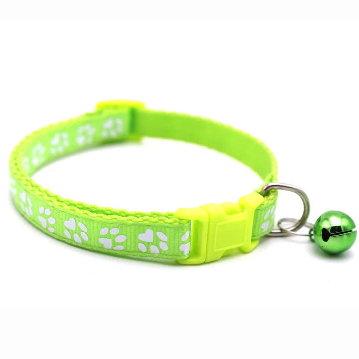 Orange colorful adjustable dog collar featuring a bowtie and bell, essential pet accessory.